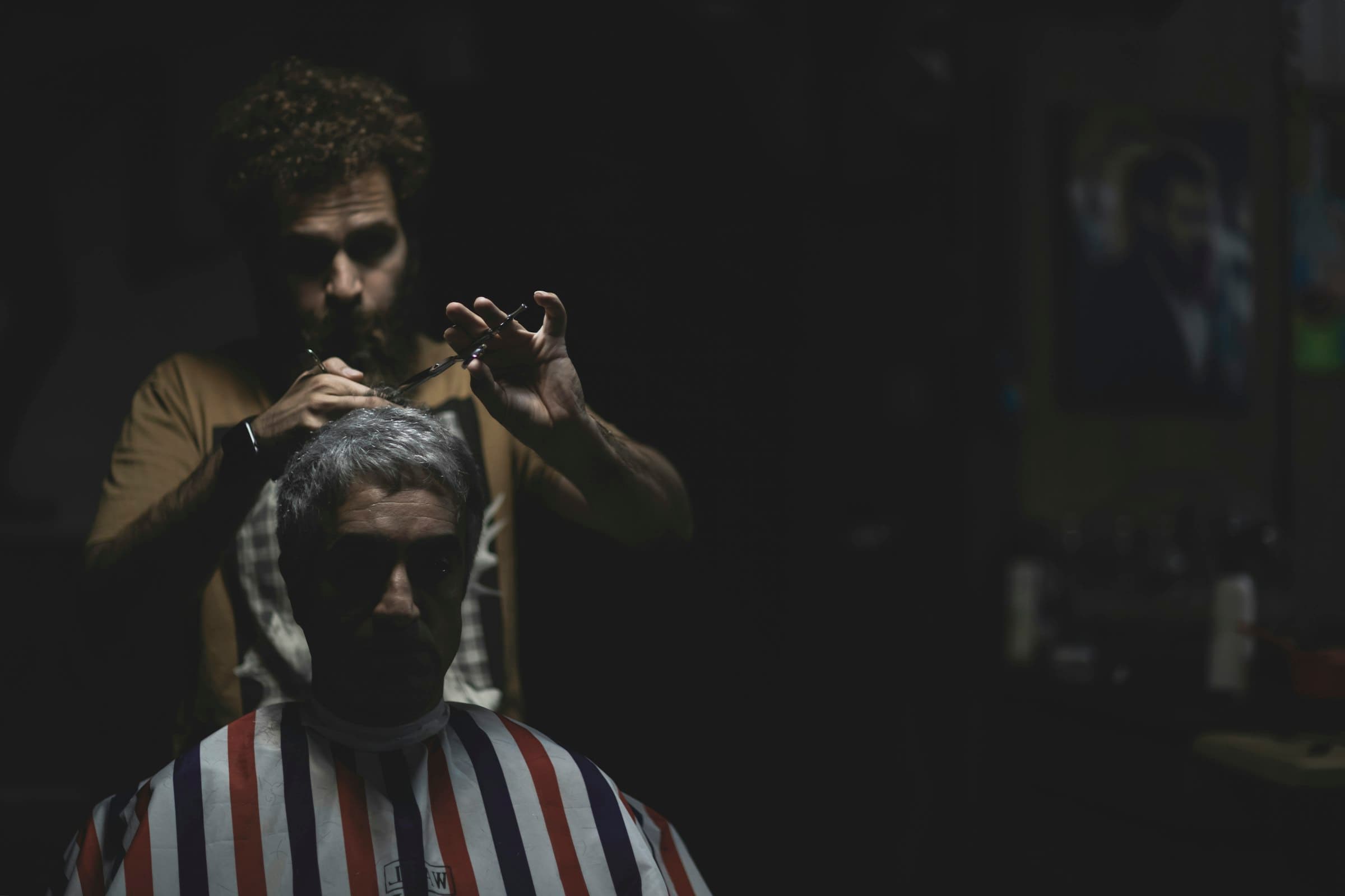 A barber at work in his shop